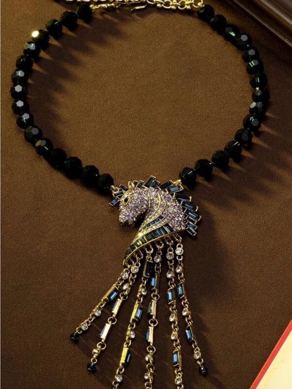 Gold-Tone Horse Head Pendant Necklace with Black Beads and Purple Accents